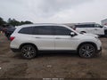 2017 Honda Pilot — photo 13 of 16 | VIN 5FNYF5H94HB041049