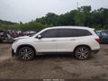 2017 Honda Pilot — photo 14 of 16 | VIN 5FNYF5H94HB041049