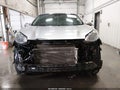2021 Kia Sportage — photo 13 of 17 | VIN KNDPMCAC9M7934524