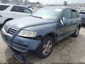 2007 Volkswagen Touareg — photo 2 of 12 | VIN WVGZE77LX7D012771