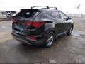 2017 Hyundai Santa Fe — photo 4 of 16 | VIN 5XYZU3LB4HG465638