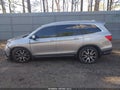 2022 Honda Pilot — photo 14 of 16 | VIN 5FNYF6H65NB052018