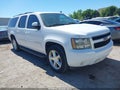 2011 Chevrolet Suburban 1500 — photo 1 of 16 | VIN 1GNSCJE08BR382427