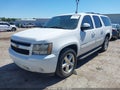 2011 Chevrolet Suburban 1500 — photo 2 of 16 | VIN 1GNSCJE08BR382427
