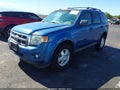 2009 Ford Escape — photo 2 of 10 | VIN 1FMCU03G79KC19593