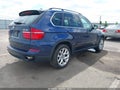 2013 BMW X5 — photo 4 of 17 | VIN 5UXZV4C59D0G50900