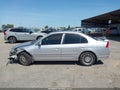 2005 Honda Civic — photo 14 of 16 | VIN 1HGES26775L007048