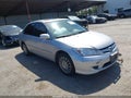 2005 Honda Civic — photo 1 of 16 | VIN 1HGES26775L007048