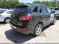 2012 Hyundai Santa Fe — photo 4 of 14 | VIN 5XYZK4AG9CG110922