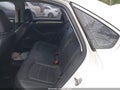 2014 Volkswagen Passat — photo 8 of 12 | VIN 1VWAT7A35EC037352