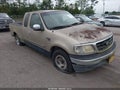 1999 Ford F-150 — photo 1 of 11 | VIN 1FTRX17W0XNC01848
