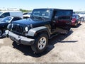 2016 Jeep Wrangler Unlimited — photo 2 of 16 | VIN 1C4BJWDG1GL265504