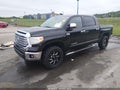 2015 Toyota Tundra — photo 2 of 19 | VIN 5TFHW5F19FX449451