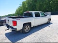 2016 Chevrolet Silverado 1500 — photo 4 of 16 | VIN 3GCUKREC5GG120580
