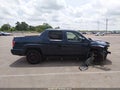2009 Honda Ridgeline — photo 12 of 18 | VIN 5FPYK16409B108203