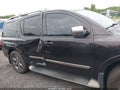 2014 Nissan Armada — photo 13 of 16 | VIN 5N1AA0NF8EN601998