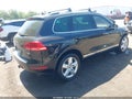 2014 Volkswagen Touareg — photo 4 of 17 | VIN WVGEF9BP0ED014303