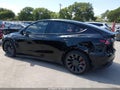 2021 Tesla Model Y — photo 14 of 22 | VIN 5YJYGDEF5MF084049