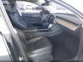 2024 Tesla Model Y — photo 5 of 17 | VIN 7SAYGDED1RF055737