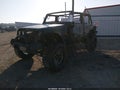 2013 Jeep Wrangler Unlimited — photo 2 of 12 | VIN 1C4BJWDG8DL643085