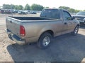 2001 Ford F-150 — photo 4 of 22 | VIN 1FTZF17271NA51843