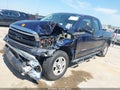 2011 Toyota Tundra — photo 2 of 15 | VIN 5TFRM5F17BX033774