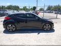 2016 Hyundai Veloster — photo 14 of 17 | VIN KMHTC6AE6GU280023