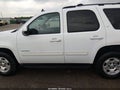 2014 Chevrolet Tahoe — photo 14 of 16 | VIN 1GNSCBE09ER247564