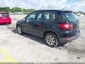 2009 Volkswagen Tiguan — photo 3 of 10 | VIN WVGAV75N19W005300