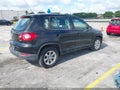 2009 Volkswagen Tiguan — photo 4 of 10 | VIN WVGAV75N19W005300