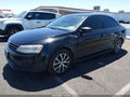 2016 Volkswagen Jetta — photo 2 of 12 | VIN 3VWD67AJ4GM365091