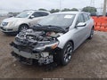 2020 Chevrolet Malibu — photo 2 of 19 | VIN 1G1ZD5ST6LF105569