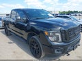 2019 Nissan Titan — photo 1 of 14 | VIN 1N6BA1F47KN527171