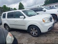2012 Honda Pilot — photo 13 of 16 | VIN 5FNYF4H91CB077896