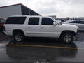 2002 Chevrolet Suburban 1500 — photo 13 of 16 | VIN 1GNFK16Z02J328121