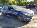 2019 Kia Optima — photo 1 of 16 | VIN 5XXGT4L35KG340636