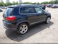 2012 Volkswagen Tiguan — photo 4 of 13 | VIN WVGBV7AXXCW595516