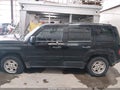 2015 Jeep Patriot — photo 13 of 15 | VIN 1C4NJPBA5FD430786