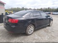 2014 Volkswagen Jetta — photo 4 of 16 | VIN 3VWD07AJ2EM288915