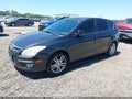 2009 Hyundai Elantra — photo 2 of 17 | VIN KMHDC86E19U040440