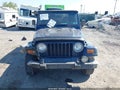 2000 Jeep Wrangler — photo 12 of 16 | VIN 1J4FA49SXYP774188