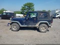 2000 Jeep Wrangler — photo 14 of 16 | VIN 1J4FA49SXYP774188