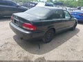 1999 Mazda 626 — photo 4 of 11 | VIN 1YVGF22C6X5881326