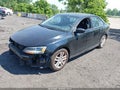 2015 Volkswagen Jetta — photo 2 of 12 | VIN 3VW2K7AJ3FM210307