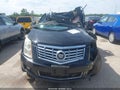 2014 Cadillac SRX — photo 11 of 15 | VIN 3GYFNEE30ES639520