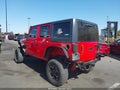 2016 Jeep Wrangler Unlimited — photo 14 of 18 | VIN 1C4BJWDG6GL266583