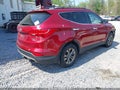 2015 Hyundai Santa Fe — photo 4 of 17 | VIN 5XYZUDLB5FG255858