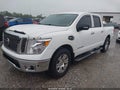 2017 Nissan Titan — photo 2 of 20 | VIN 1N6AA1E57HN514712