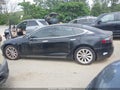 2017 Tesla Model S — photo 13 of 18 | VIN 5YJSA1E19HF202443