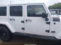2014 Jeep Wrangler Unlimited — photo 13 of 16 | VIN 1C4BJWEG4EL216177